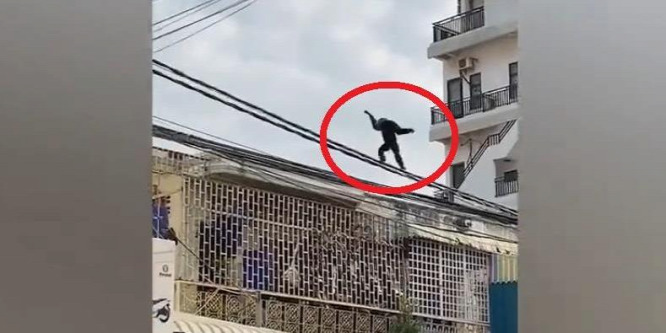 Hihetetlen, mit láttak a járókelők egyensúlyozni a villanyvezetéken – videó